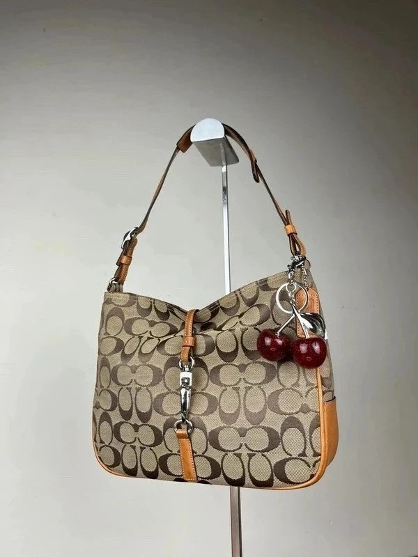 Vintage Coach Signature Hampton Clip Hobo 6091